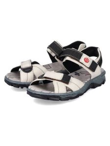 Rieker Sandały w kolorze kremowym rozmiar: 38. Brązowe sandały Rieker, bez wzorów, z otwartym noskiem, bez obcasa, bez zapięcia. Za 164,02 zł.