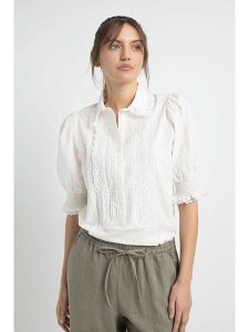Josephine & Co Bluzka "Jenny" w kolorze białym rozmiar: 40. Białe bluzki Josephine & Co, bez wzorów, z bawełny, bez kołnierzyka, bez ramiączek. Za 250,35 zł.