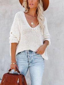 Milan Kiss Sweter w kolorze kremowym rozmiar: L. Brązowe swetry oversize Milan Kiss, l, bez wzorów, ze splotem, bez ramiączek. Za 262,91 zł.