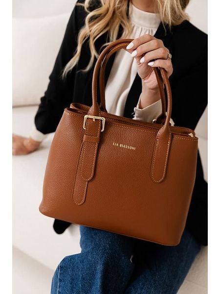 Lia Biassoni Skórzana torebka w kolorze jasnobrązowym - 33 x 25 x 11 cm rozmiar: onesize. Brązowe torebki klasyczne Lia Biassoni, bez wzorów, z materiału, przez ramię, bez dodatków. Za 304,99 zł.