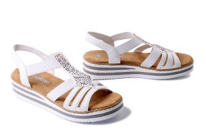 RIEKER V0240-80 white, sandały damskie. Białe sandały Rieker, bez wzorów, bez obcasa, na koturnie, bez zapięcia. Za 223,93 zł.