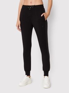 Guess Spodnie dresowe V2YB18 K7UW2 Czarny Regular Fit. Czarne spodnie dresowe Guess, xl, z aplikacjami, z dresówki. Za 289,99 zł.