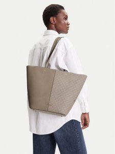 MICHAEL Michael Kors Torebka Flora 30T5GFFT3B Beżowy. Brązowe shopper bag MICHAEL Michael Kors, bez wzorów, ze skóry, bez dodatków. Za 795,99 zł.
