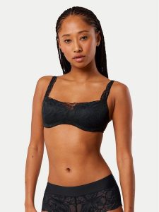 Triumph Biustonosz z fiszbiną Illusion 10219845 Czarny. Czarne biustonosze Triumph, bez wzorów, z syntetyku. Za 157,50 zł.