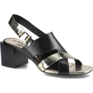 Czarne Sandały Karino Damskie Modne Buty Damskie. Czarne sandały Karino, bez wzorów, ze skóry, bez obcasa, na obcasie, bez zapięcia. Za 219,00 zł.