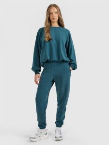 4F Spodnie dresowe joggery z modalem damskie - turkusowe M. Niebieskie spodnie dresowe 4f, m, bez wzorów, z dresówki. Za 169,99 zł.