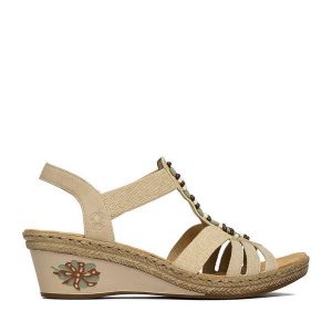 Sandały Rieker. Brązowe sandały Rieker, bez wzorów, bez obcasa, na koturnie, bez zapięcia. Za 319,99 zł.