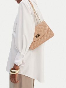 Badura Torebka TYL00493 Beżowy. Brązowe listonoszki Badura, bez wzorów, z materiału, bez dodatków. Za 199,99 zł.