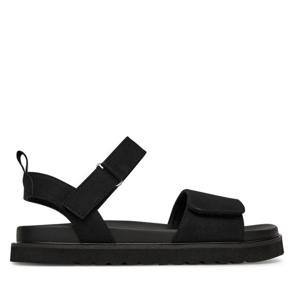 Sandały JENNY. Czarne sandały Jenny, bez wzorów, bez obcasa, na płaskiej podeszwie, bez zapięcia. Za 119,99 zł.