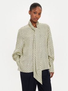 Tommy Hilfiger Bluzka WW0WW42294 Żółty Relaxed Fit. Żółte bluzki TOMMY HILFIGER, bez wzorów, z wiskozy, bez kołnierzyka, bez ramiączek. Za 319,99 zł.