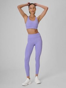 4F Legginsy treningowe szybkoschnące damskie - fioletowe S. Fioletowe legginsy 4f, bez wzorów, z materiału, z podwyższonym stanem. Za 169,99 zł.