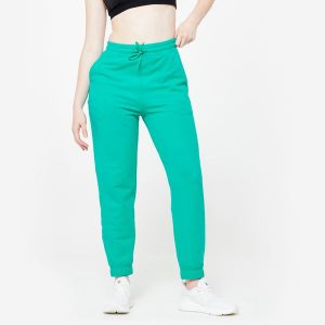 Spodnie dresowe damskie Domyos Gym & Pilates. Brązowe spodnie dresowe DOMYOS, s, bez wzorów, z bawełny. Za 89,99 zł.