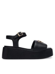 LOVE MOSCHINO Sandały JA16127I0OIA0000 Czarny. Czarne sandały LOVE MOSCHINO, bez wzorów, z materiału, bez obcasa, na koturnie, bez zapięcia. Za 594,99 zł.
