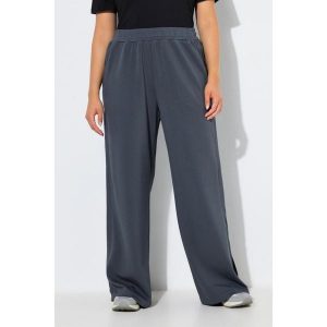 Damskie Spodnie dresowe rozcięcia po bokach szerokie nogawki elastyczny pas. Fioletowe rajstopy i pończochy Ulla Popken, bez wzorów, z dresówki. Za 279,99 zł.