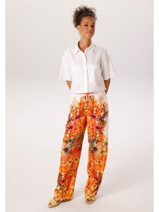 Aniston Spodnie w kolorze pomarańczowo-białym rozmiar: 40. Białe spodnie z wysokim stanem Aniston, bez wzorów, z materiału, z podwyższonym stanem. Za 173,99 zł.