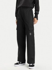 Champion Spodnie dresowe 117201 Czarny Relaxed Fit. Czarne spodnie dresowe Champion, s, bez wzorów, z bawełny. Za 179,99 zł.