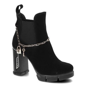 Czarne Botki Carinii Damskie Eleganckie Buty Na Słupku. Czarne botki Carinii, na jesień, bez wzorów, ze skóry, bez obcasa, na słupku, bez zapięcia. Za 359,00 zł.