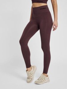 Damskie wysokie legginsy Hummel TIF. Brązowe legginsy Hummel, bez wzorów, z dzianiny. Za 160,50 zł.
