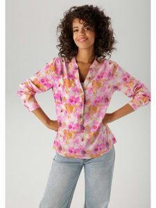 Aniston Bluzka w kolorze różowo-pomarańczowym rozmiar: 40. Różowe bluzki Aniston, bez wzorów, z wiskozy, bez kołnierzyka, bez ramiączek. Za 47,82 zł.