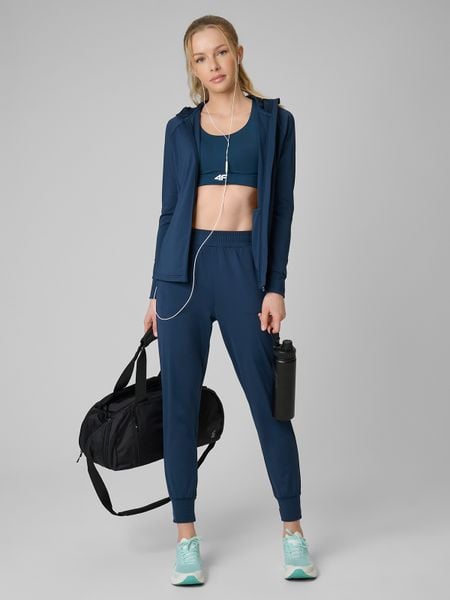 4F Spodnie treningowe szybkoschnące damskie - turkusowe XS. Niebieskie spodnie dresowe 4f, xs, bez wzorów, z elastanu, na fitness i siłownię. Za 179,99 zł.