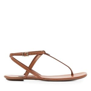 Sandały GINO ROSSI. Brązowe sandały Gino Rossi, bez wzorów, bez obcasa, na płaskiej podeszwie, bez zapięcia. Za 249,99 zł.