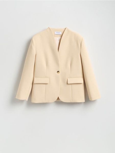 Jednorzędowa marynarka - kremowy. Białe marynarki i żakiety Reserved, l, bez wzorów, z tkaniny. Za 259,99 zł.