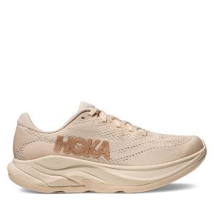 Buty do biegania Hoka. Brązowe buty sportowe Hoka, bez wzorów, bez zapięcia, do biegania. Za 499,99 zł.