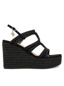 Guess Sandały FLJERS FAB04 Czarny. Czarne sandały Guess, z aplikacjami, z materiału, bez obcasa, na koturnie, bez zapięcia. Za 577,99 zł.