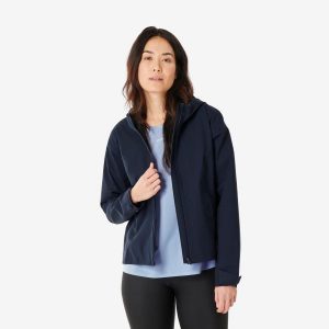 Kurtka turystyczna damska Quechua MH100. Niebieskie kurtki QUECHUA, s, bez wzorów, z materiału, bez kaptura. Za 199,99 zł.