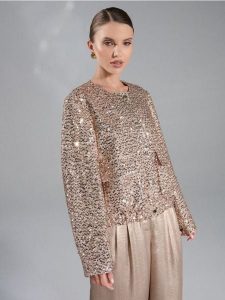 Żakiet z połyskującymi cekinami - złoty. Żółte marynarki i żakiety Sinsay, l, bez wzorów. Za 69,99 zł.