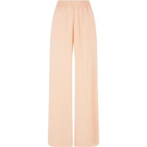 Damskie spodnie z szeroką nogawką z wiskozy Urban Classics. Zielone spodnie dresowe Urban Classics, bez wzorów, z wiskozy. Za 206,00 zł.