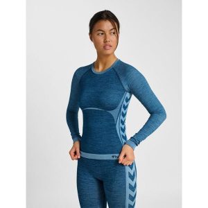 Damska dopasowana koszulka z długim rękawem bez szwów Hummel Clea. Niebieskie koszule nocne Hummel, bez wzorów, bez ramiączek. Za 263,00 zł.