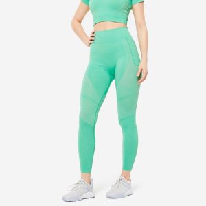 Legginsy fitness damskie Domyos. Zielone legginsy DOMYOS, bez wzorów, z elastanu, z podwyższonym stanem. W wyprzedaży za 79,99 zł.