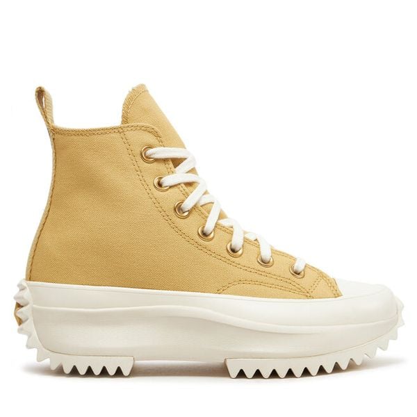 Trampki Converse. Żółte trampki Converse, bez wzorów, bez zapięcia. Za 379,99 zł.