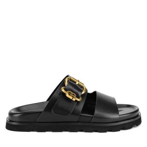 Klapki GINO ROSSI. Czarne klapki Gino Rossi, bez wzorów, bez obcasa. Za 329,99 zł.