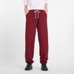 Spodnie damskie New Balance WP41513MHB – bordowe. Czerwone spodnie dresowe New Balance, m, bez wzorów, z bawełny. Za 379,99 zł.