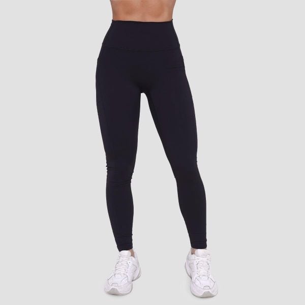 Legginsy damskie fitness z kieszeniami czarne Ignite. Czarne legginsy GYMBEAM, bez wzorów, z elastanu. Za 115,90 zł.
