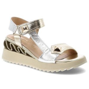 Sandały damskie S.Barski, cholewka ze skóry naturalnej na podwyższonej podeszwie z dekoracyjnym wycięciem w obcasie i metalicznymi paskami z geometry. Żółte sandały S.BARSKI, bez wzorów, ze skóry, bez obcasa, na koturnie, bez zapięcia. Za 260,90 zł.