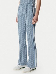 Lacoste Spodnie dresowe XF9313 Niebieski jasny Regular Fit. Niebieskie spodnie dresowe Lacoste, bez wzorów, z bawełny. Za 493,99 zł.