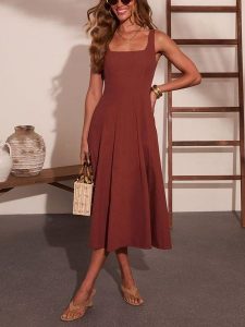Milan Kiss Sukienka w kolorze brązowym rozmiar: XL. Brązowe sukienki Milan Kiss, xl, bez wzorów, bez kołnierzyka, bez ramiączek, maxi. Za 239,95 zł.