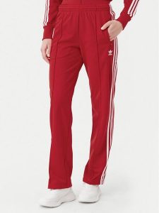 Adidas Spodnie dresowe adicolor Classics Firebird IR8081 Czerwony Regular Fit. Czerwone spodnie dresowe ADIDAS, s, bez wzorów, z dresówki. Za 219,99 zł.