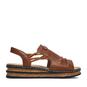 Sandały Rieker. Brązowe sandały Rieker, bez wzorów, bez obcasa, na koturnie, bez zapięcia. Za 299,99 zł.