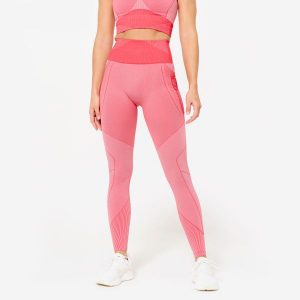 Legginsy fitness damskie Domyos. Czerwone legginsy DOMYOS, bez wzorów, z elastanu. W wyprzedaży za 119,99 zł.