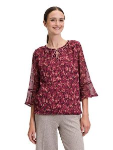 CARTOON Bluzka w kolorze czerwonym rozmiar: 38. Czerwone bluzki Cartoon, bez wzorów, bez kołnierzyka, bez ramiączek. Za 104,99 zł.