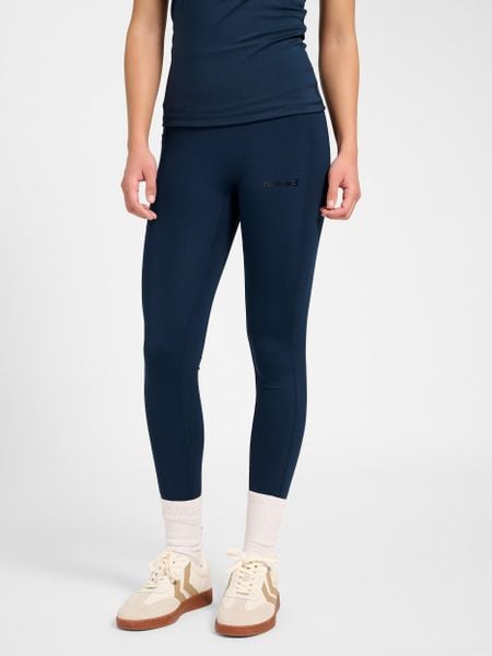 Damskie legginsy Hummel Prima. Niebieskie legginsy Hummel, bez wzorów, z materiału. Za 216,00 zł.