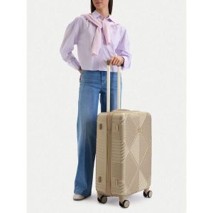 Walizka średnia Nine West. Żółte walizki Nine West, bez wzorów, średnie. Za 359,99 zł.