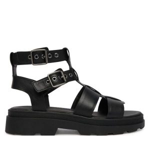 Sandały Clarks. Czarne sandały Clarks, bez wzorów, bez obcasa, na płaskiej podeszwie, bez zapięcia. Za 389,99 zł.