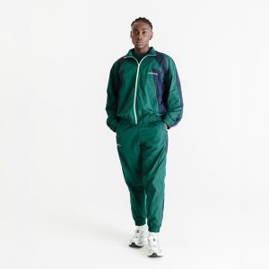 Spodnie dresowe unisex Decathlon AFLF zielone. Zielone spodnie dresowe DECATHLON, s, bez wzorów, z dresówki. W wyprzedaży za 99,99 zł.