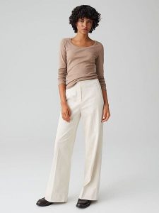 OPUS Spodnie w kolorze kremowym rozmiar: 44. Brązowe spodnie z wysokim stanem Opus, bez wzorów, z materiału, z podwyższonym stanem. Za 143,99 zł.