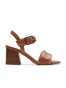 Clarks Skórzane sandały "Siara65 Buckle" w kolorze jasnobrązowym na obcasie rozmiar: 40. Brązowe sandały Clarks, bez wzorów, z otwartym noskiem, bez obcasa, na koturnie, bez zapięcia. Za 184,46 zł.